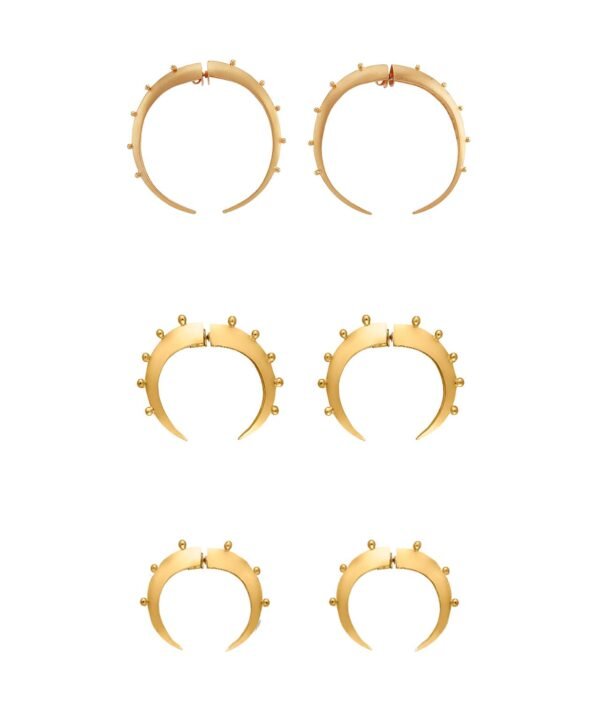 image of the different sizes of crescent hoop silver earrings. First the big ones, followed by the medium and then the baby hoops.
