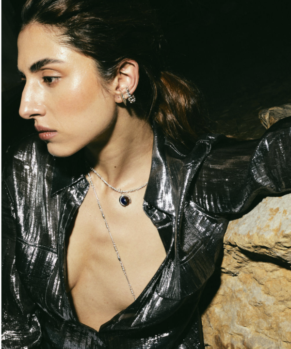 juana del rio wearing a silver shirt and silver jewelry Made by aysha bilgrami in recycled silver in bogota colombia